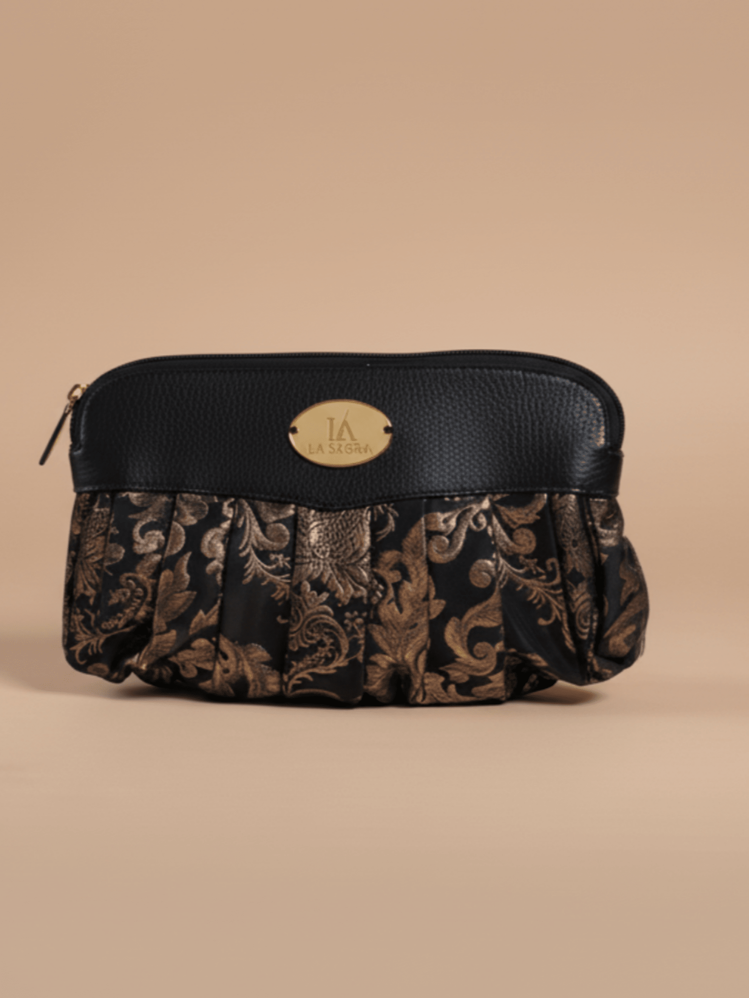 Black clutch bag with floral pattern and gold logo on a beige background