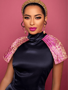 Model wearing the Vivana dress, a South Asian–inspired, artisan-crafted dress with intricate detailing and a modern, refined silhouette