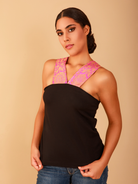 Model wearing the Dolce Top, an artisan-crafted blouse with South Asian–inspired detailing and a modern, tailored silhouette