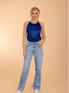 Halter top styled with tailored bottoms for an elevated, contemporary look rooted in South Asian craftsmanship