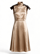 Shop The Viviana Dress by La' Agra: intricate South Asian–inspired detailing and a refined, artisan-crafted silhouette in navy, champagne, and white.