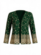 The Luminara Jacket by La' Agra: an embroidered green jacket with patterned detail that layers over a simple top and jeans for an instant statement.