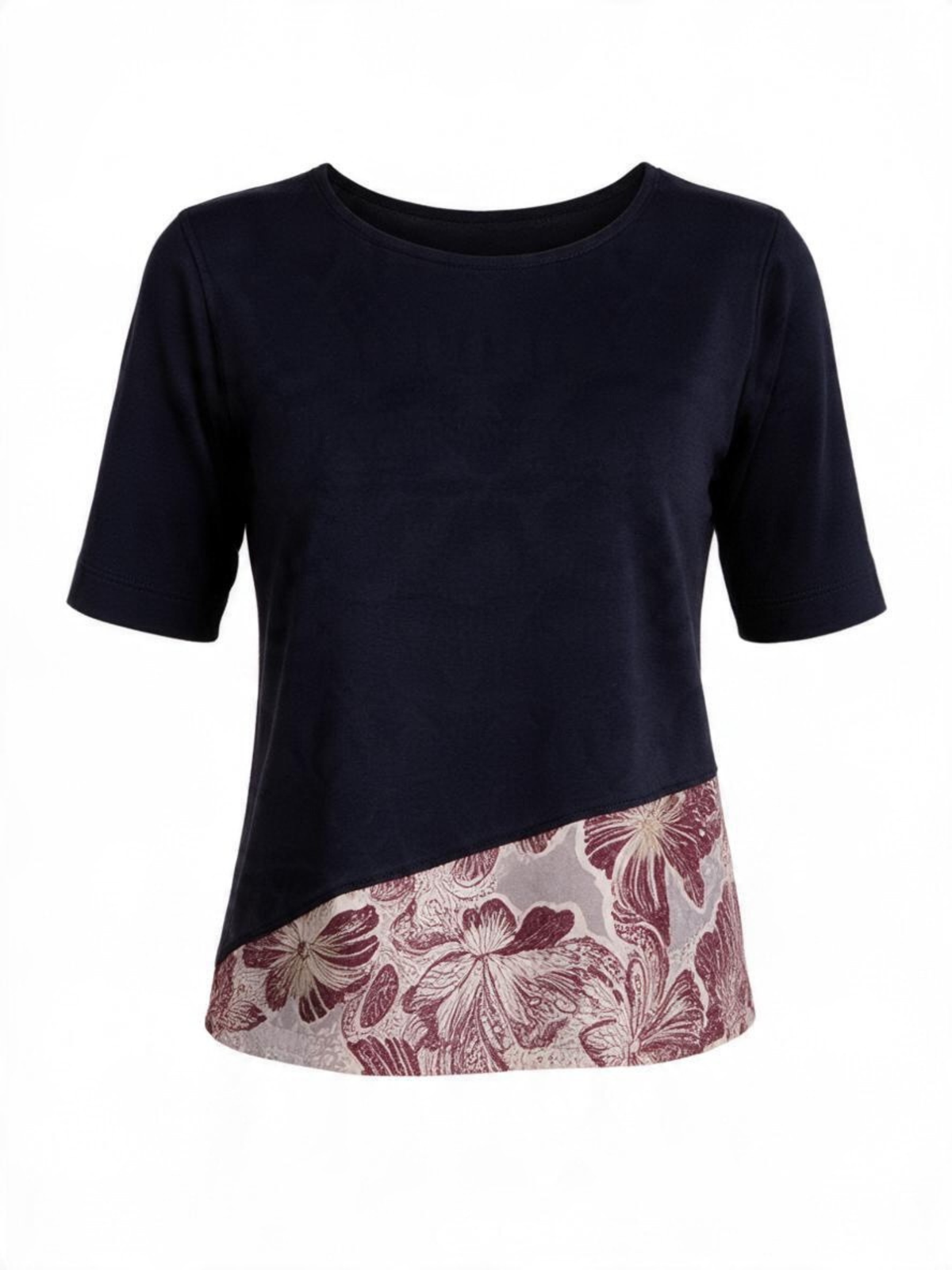 The Sage Top by La' Agra: a black top with a South Asian–inspired floral pattern. An easy, artisan-crafted piece that pairs with denim or trousers.